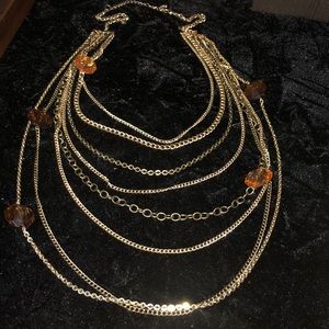 Long layers necklace in gold and bronze tones